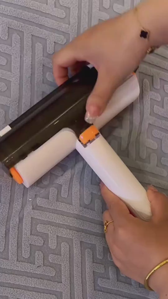 CJ supplier demonstration — the single white and orange pet hair roller in use and its collection chamber
